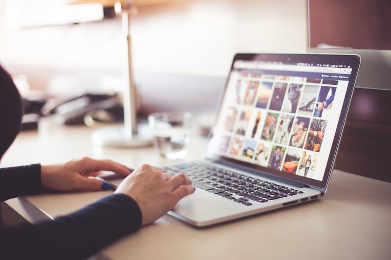 Person viewing marketing content on a laptop