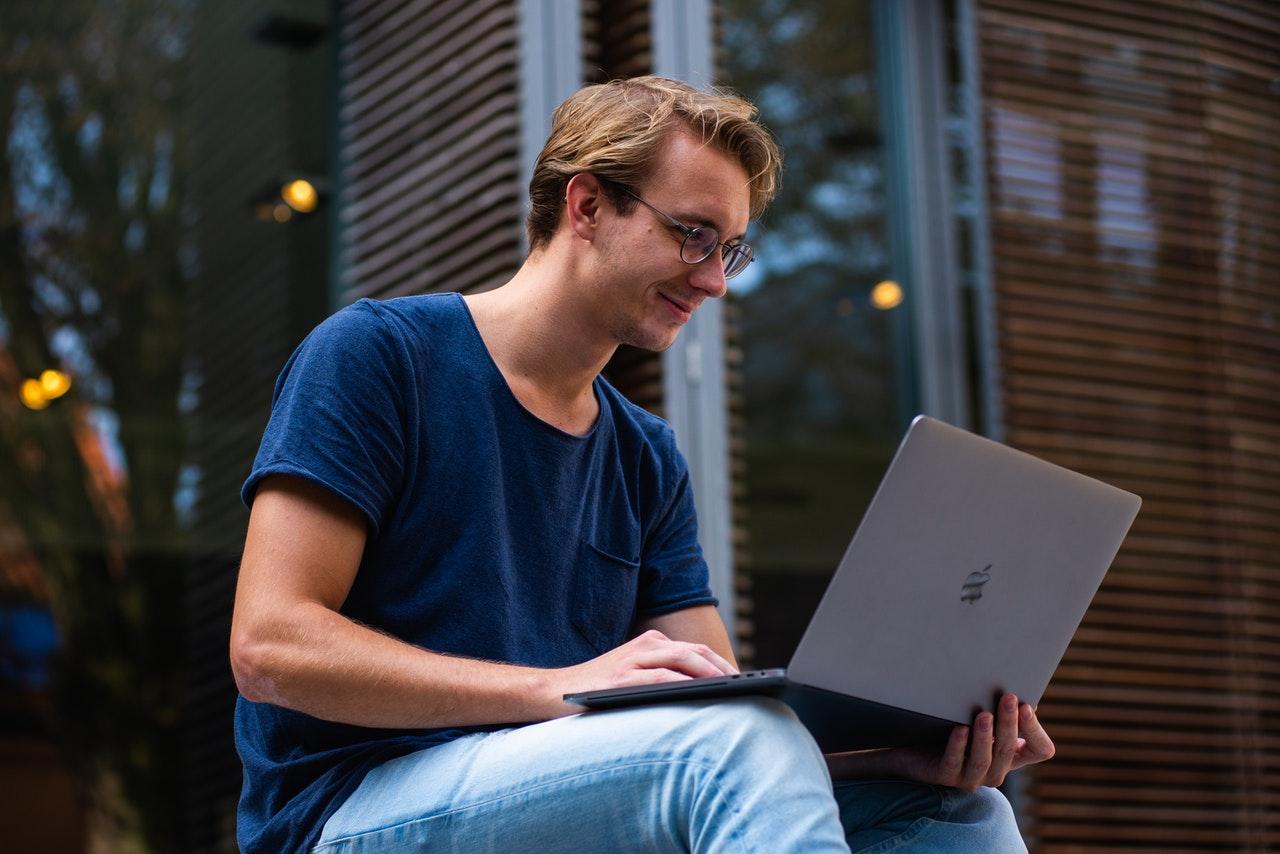 Man looking at his laptop