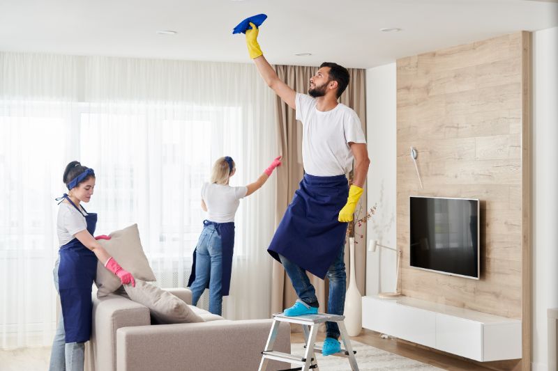 a team of people doing cleaning services