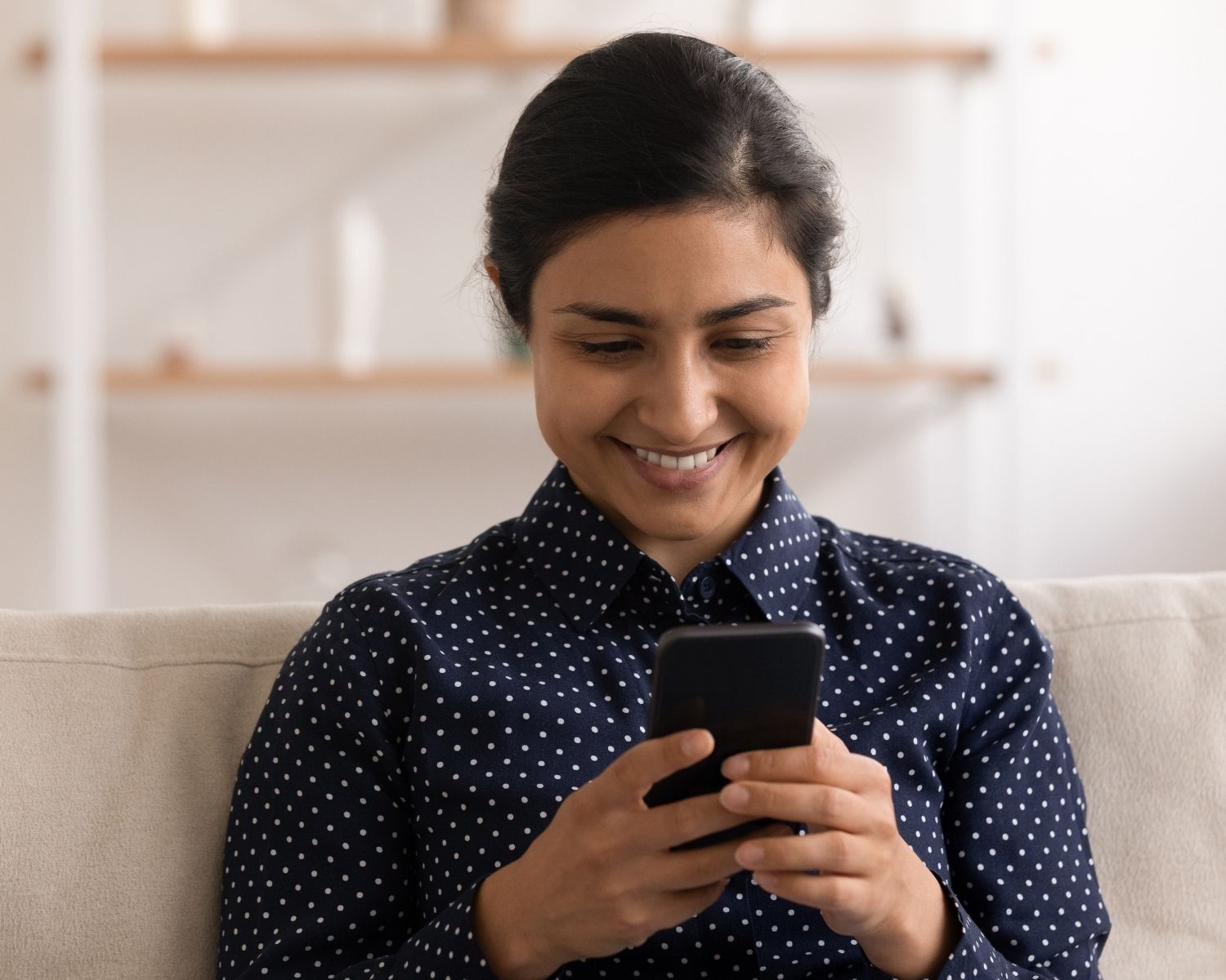 casual woman browsing iphone