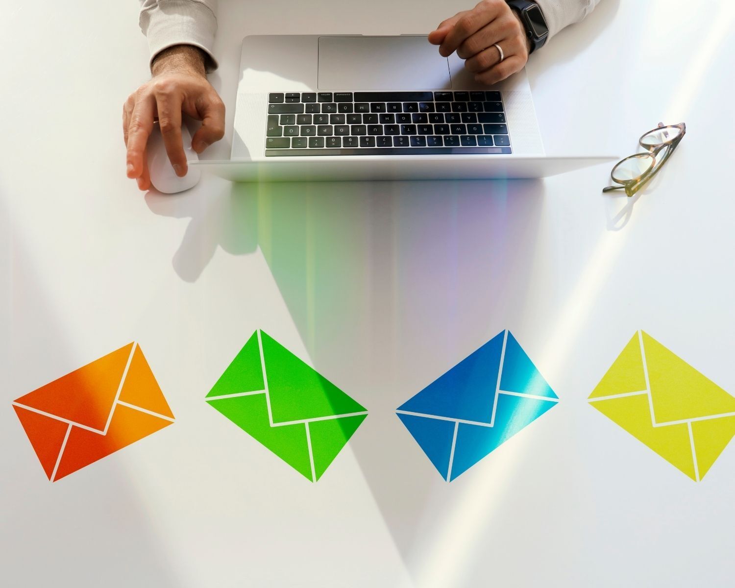 envelopes on table - Spam Trap Email Addresses and How to Avoid Them