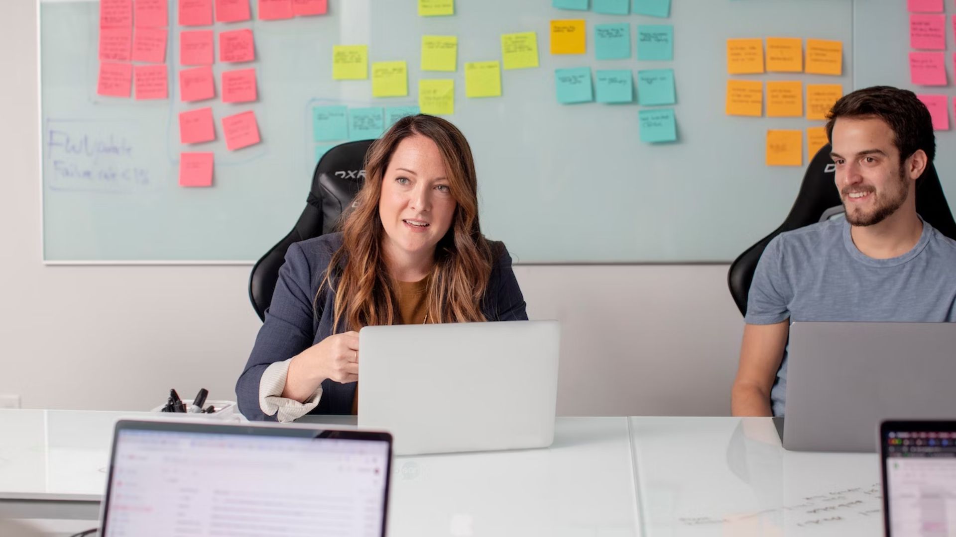 woman with sticky notes on the background 