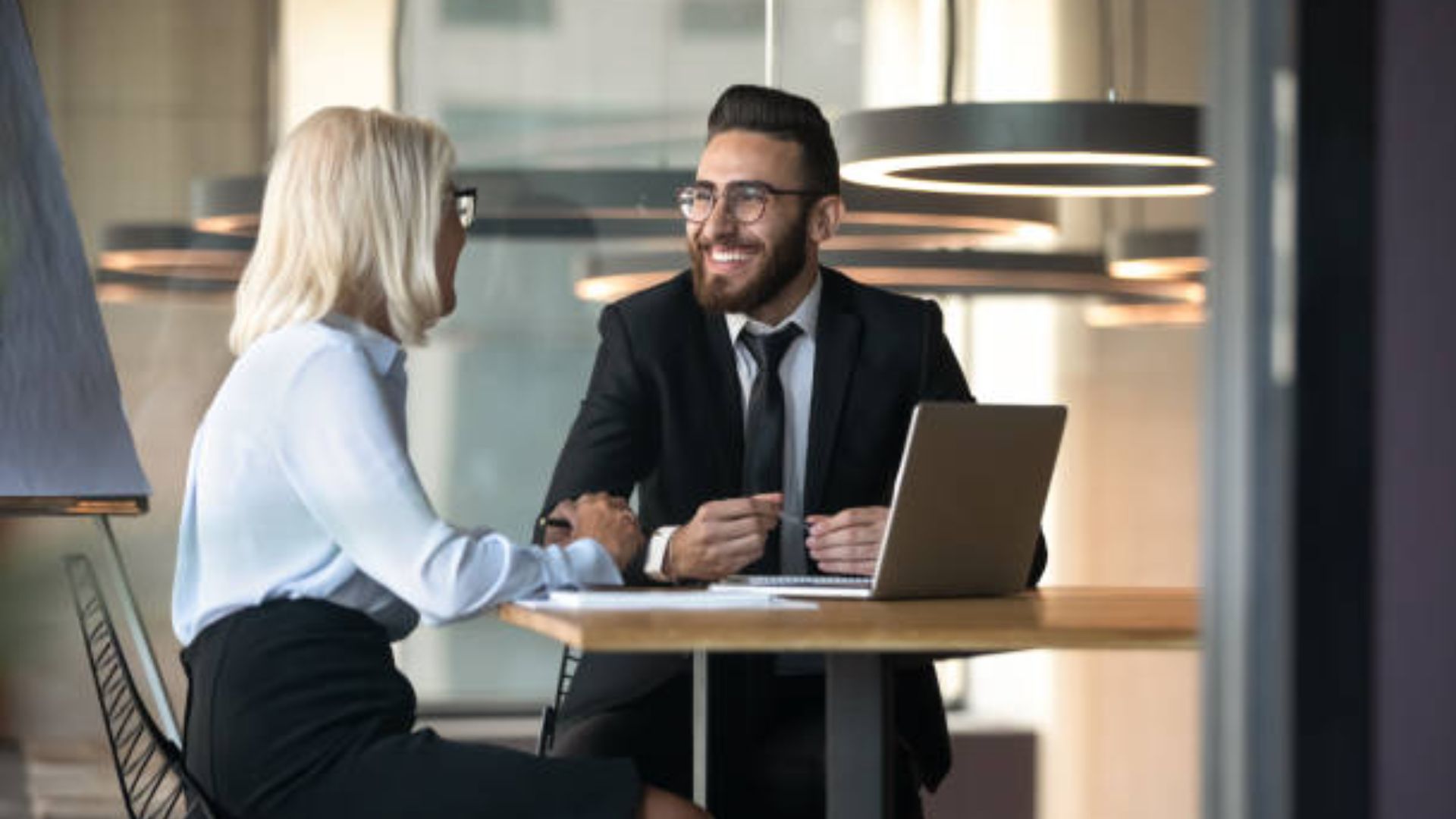 two colleagues having a fun chat