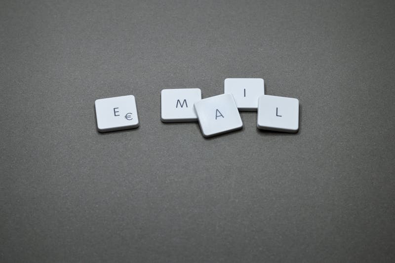 The word email spelled out on a gray surface.