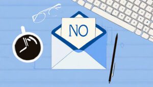 An illustration of a desktop with a cup of coffee, glasses, keyboard, pen, and an envelope marked "inbox" with the word "no" emerging from it.