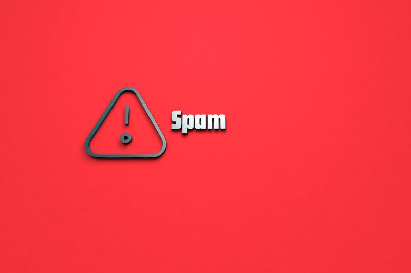 Red text "Spam!" with an exclamation mark, highlighting the potential cause of Yahoo email bouncing back