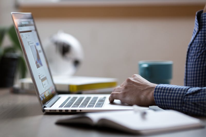 Person using a laptop, encountering an SPF failure