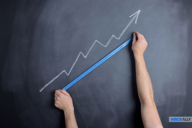 Chalkboard graph with upward trend, symbolizing growth achieved through an effective email marketing customer journey strategy
