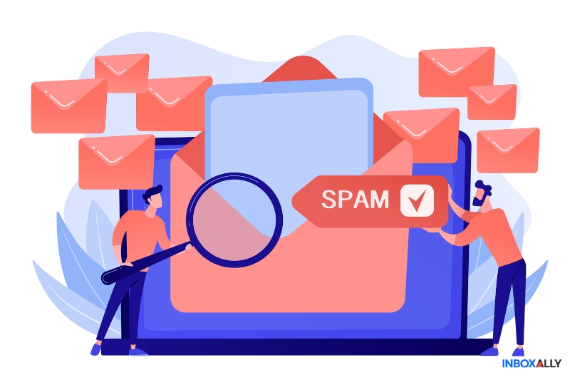 Illustration of two people managing email spam: one uses a magnifying glass while the other holds a spam notification in front of an oversized envelope and emails, showcasing InboxAlly as an intuitive Mail-Tester alternative for efficient spam filter management.