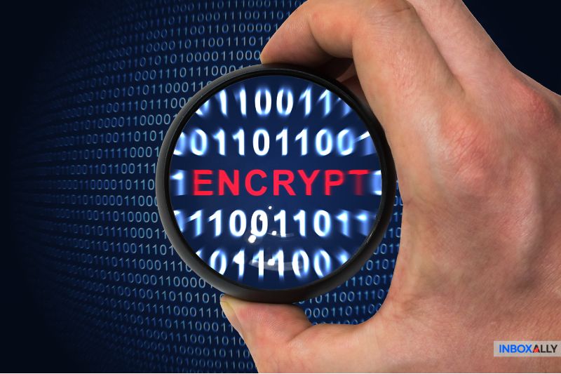 A magnifying glass over binary code and the word "ENCRYPT," illustrating "what is a secure emai