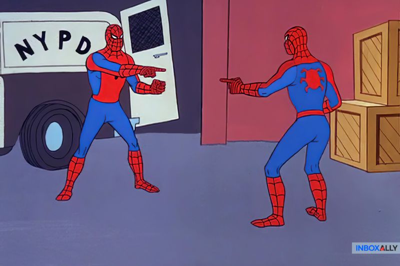 Two Spider-Man characters stand in front of an NYPD vehicle, pointing at each other in a warehouse setting, as if trying to solve an error code mystery that even the 550 5.1.1 User Unknown Error couldn't complicate further.