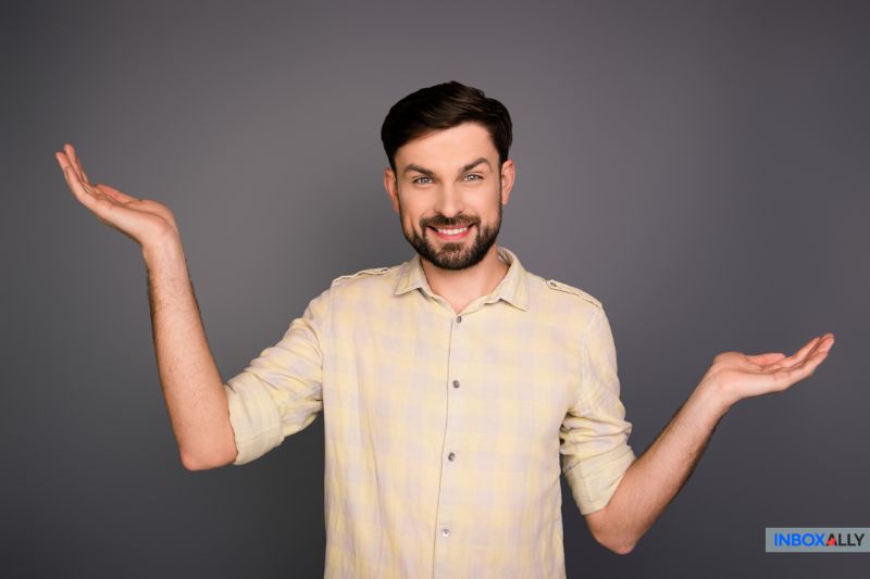 Smiling man shrugging, symbolizing confusion about SMTP relay and its role in email delivery and authentication.