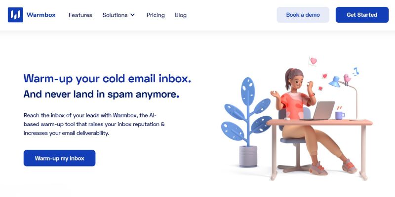 Woman sitting at a desk using a laptop, surrounded by hearts and email icons, with text promoting an AI tool to improve email deliverability—perfect for those exploring Mailreach.co alternatives.